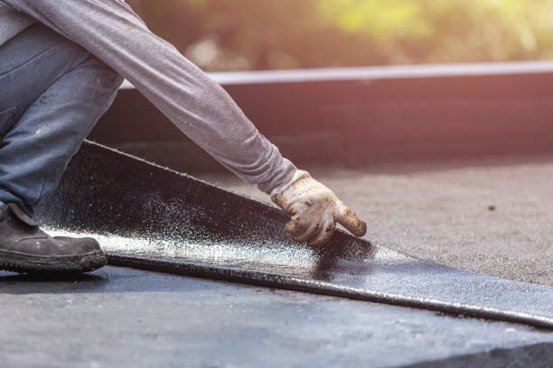 Professional Basement Waterproofing technician working in Penns Grove, NJ